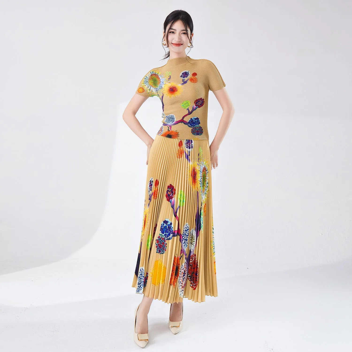 2025 Women's clothing spring and summer wear a complete set of high-end printed slim-fit T-shirt big pendulum skirt pleated two-piece set