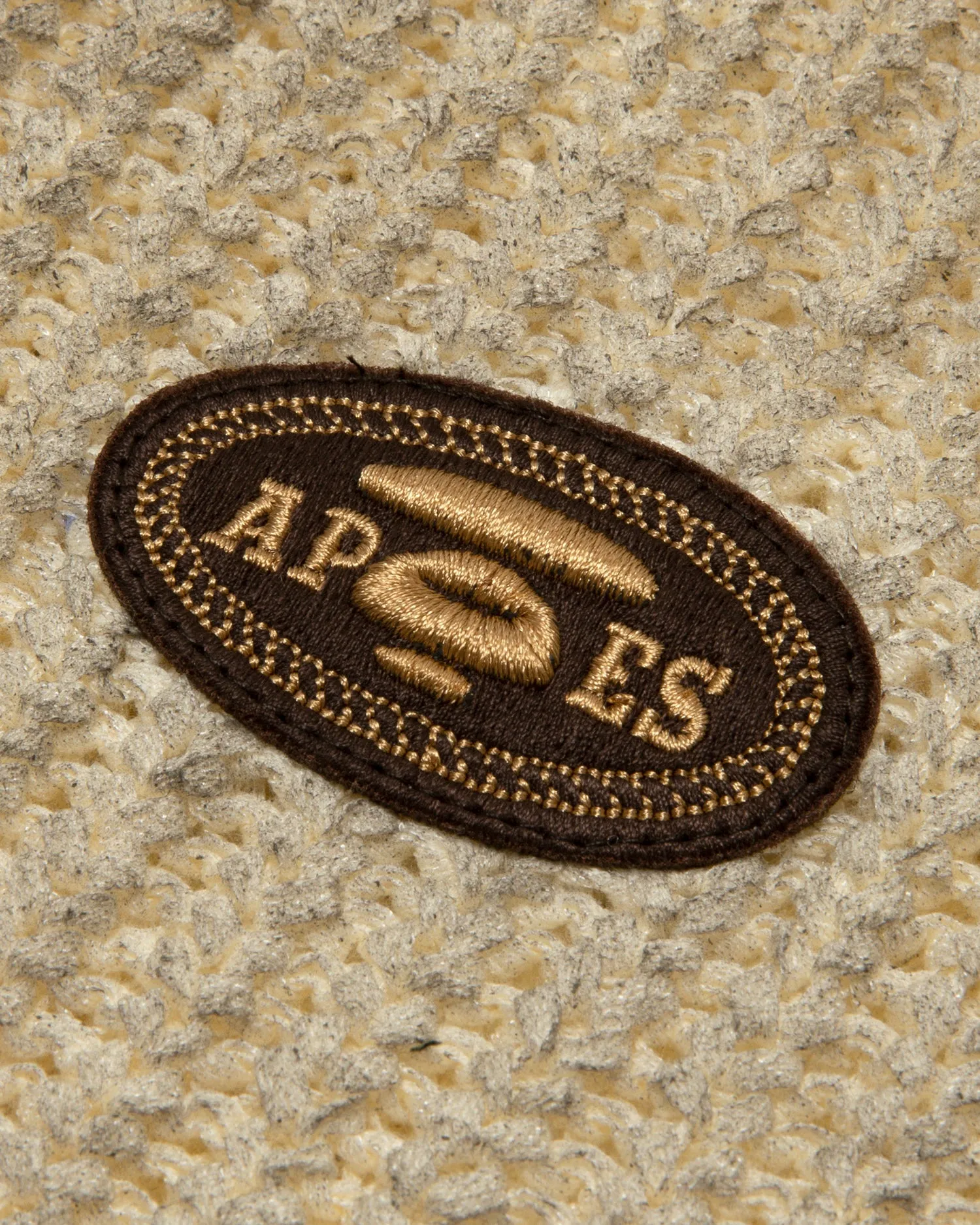 AAPEUNVS moonface logo knit button down shirt